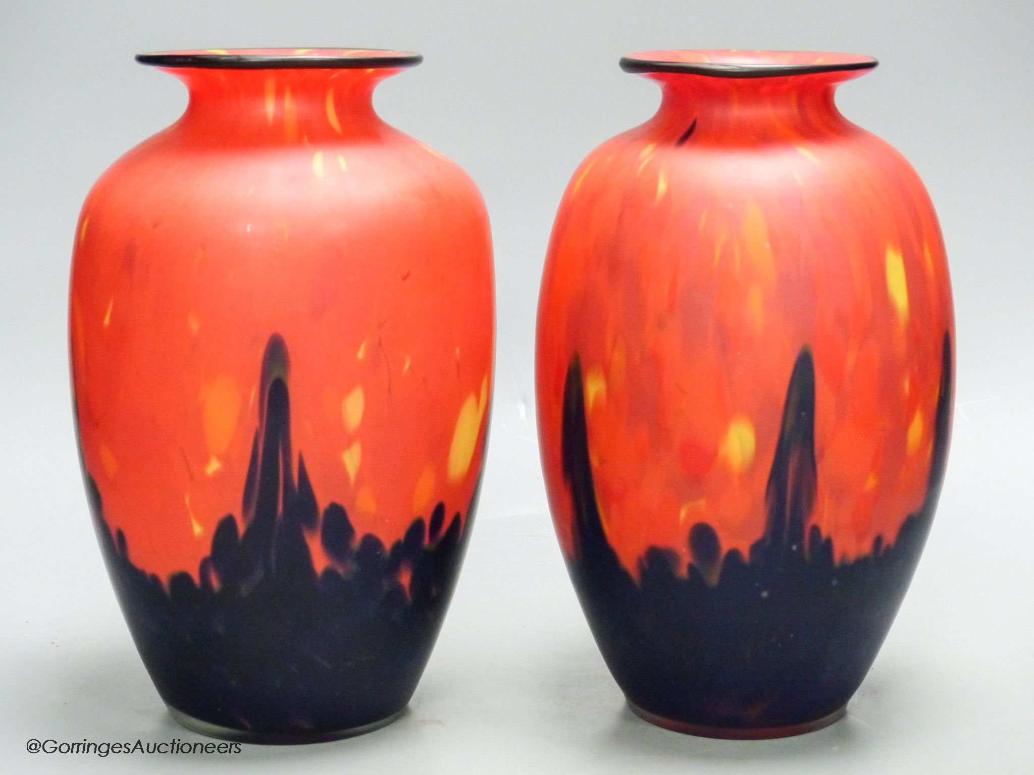 A pair of modern red and black art glass vases, height 23cm